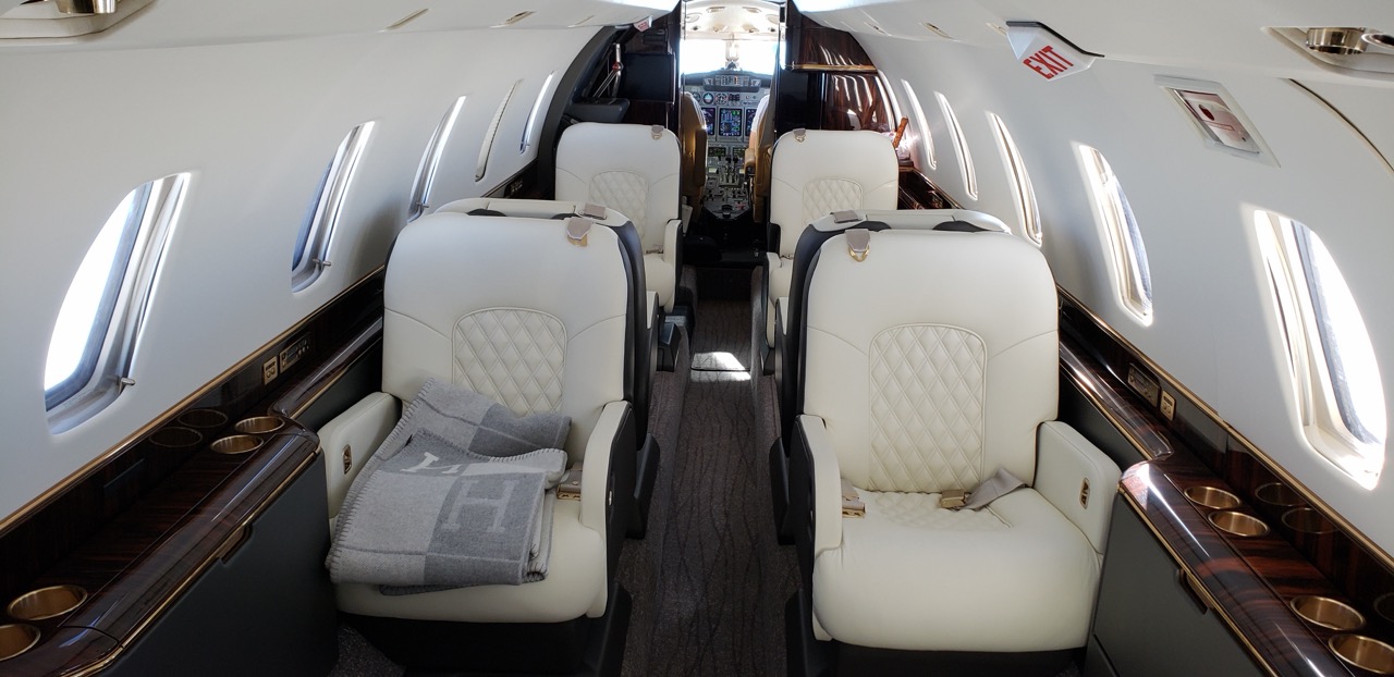 Private jet cabin interior, aircraft ownership investment