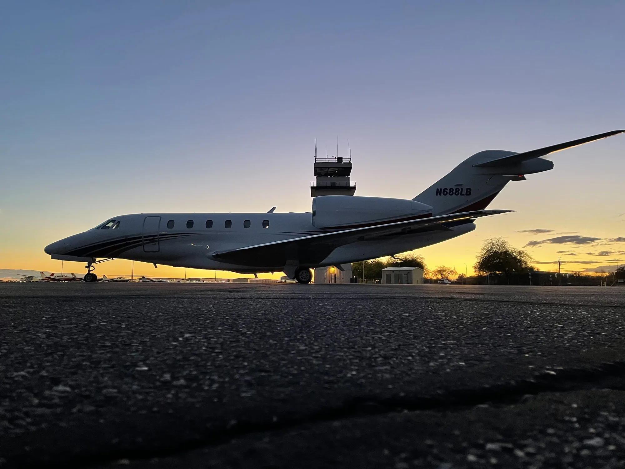 Business jet on the ramp at sunset, Jet Corp fractional ownership